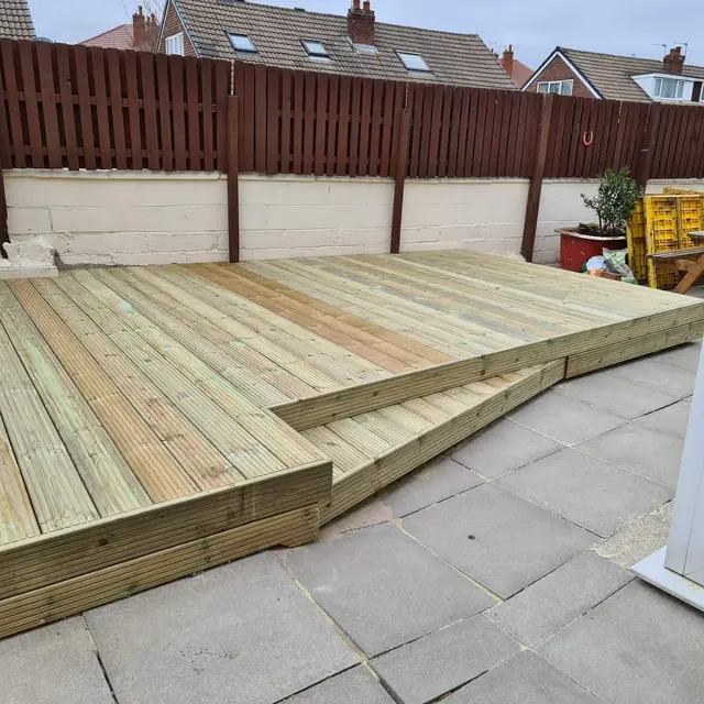 New timber decking laid over a patio